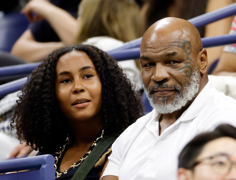 Boxing great Mike Tyson and daughter Milan Tyson watch Serena Williams's US Open third round match against Ajla Tomljanovic in New York. EPA