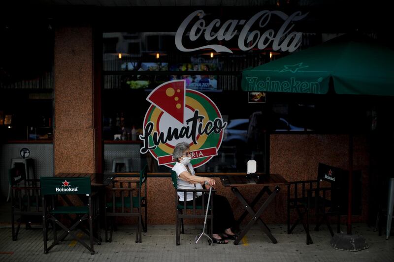 A resident awaits her turn for a first dose of Russia’s Sputnik V at a vaccination site set up at the Luna Park arena in Buenos Aires, Argentina. AP Photo