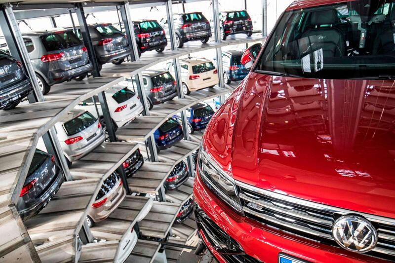 (FILES) In this file photo taken on March 14, 2017 German carmaker Volkswagen's cars are seen at the storage facility auto tower at the company's headquarters in Wolfsburg. - The first major court case against Volkswagen over its cheating of emissions tests on 11 million diesel vehicles worldwide begins on September 10, 2018. (Photo by Odd ANDERSEN / AFP)