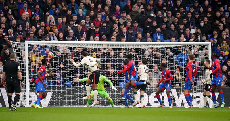 Virgil van Dijk heads home Liverpool's first goal. PA