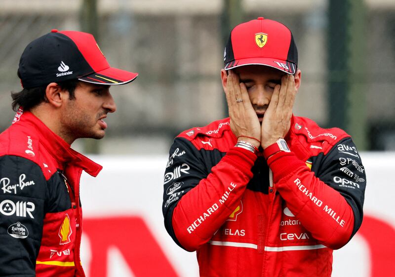 Ferrari team mates Charles Leclerc and Carlos Sainz learn of their second and third positions respectively on the starting grid for Sunday's Formula One Japanese Grand Prix at the Suzuka Circuit. Red Bull's Max Verstappen takes poll. Reuters