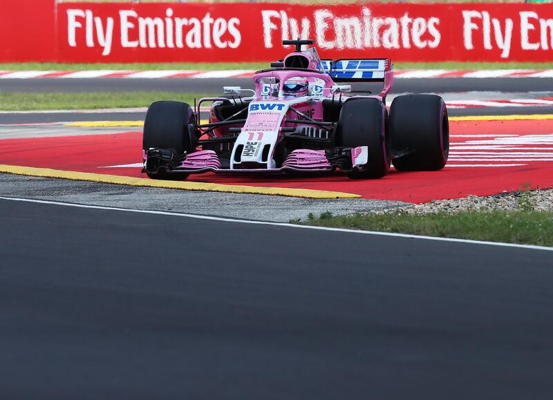 Force India's Mexican driver Sergio Perez steers his car during a free practice session ahead of the Formula One Hungarian Grand Prix at the Hungaroring circuit in Mogyorod near Budapest, Hungary, on July 28, 2018.    / AFP / FERENC ISZA
