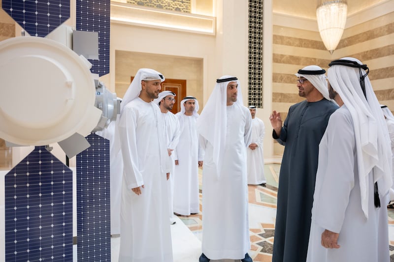 The President and Sheikh Mohammed speak to Salem Al Marri, director general of the Mohammed bin Rashid Space Centre. Photo: Abdulla Al Neyadi / Presidential Court