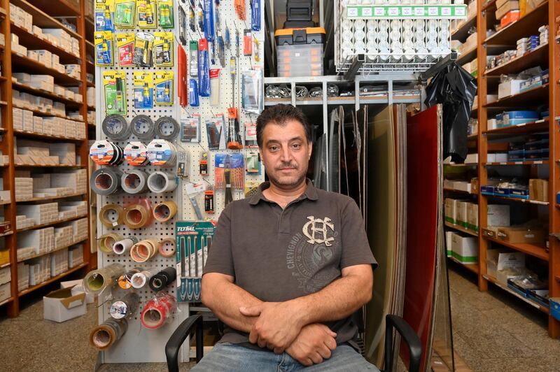Syrian refugee Noureldin Moutaweh, 45, from eastern Ghouta, Syria, speaks during an interview as he works inside in a hardware store in Beirut, Lebanon.  Noureldin Moutaweh, owner of a mobile shop in Syria, now working in a hardware store that is not related to his previous field of work but to be able to support his family which consists of his wife and 7 daughters. World Refugee Day is marked annually on 20 June. According to the UNHCR, more and more refugees today live in urban settings outside refugee camps. EPA