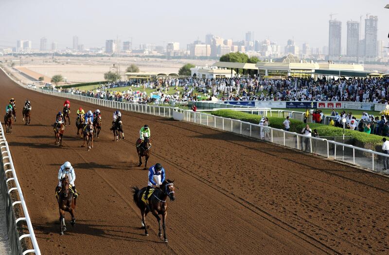 Dubai, United Arab Emirates - November 01, 2019: Mutawakked (front) ridden by Szczepan Mazur wins the Al Reda Insurance Brokers race on the opening meeting at Jebel Ali racecourse. Friday the 1st of November 2019. Jebel Ali racecourse, Dubai. Chris Whiteoak / The National