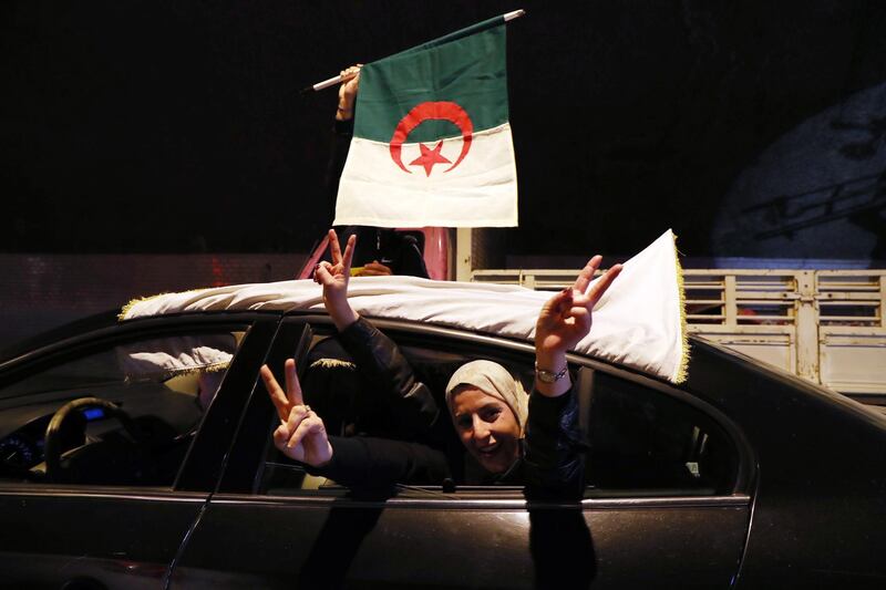 epa07429620 People celebrate on the streets after Algerian President Abdelaziz Bouteflika announced the withdrawal of his bid to run for a fifth term and postponed the elections in Algiers, Algeria, 11 March 2019. According to official Algerian media reports, President Bouteflika on 11 March announced that he will not run for a fifth Presidential term and the postponement of the Presidential elections previously scheduled for 18 April 2019. Protests errupted on 22 February demanding that Bouteflika, who became President in 1999, not run for a fifth term.  EPA/MOHAMED MESSARA