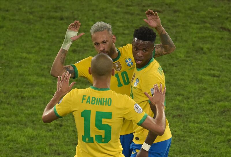 Brazil's Neymar and Fabinho celebrate at the end of their victory over Peru in the Copa America semi-final.