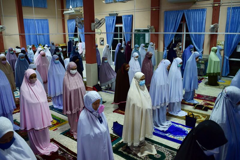 Women gather for prayer at a mosque in Narathiwat, Thailand. AFP