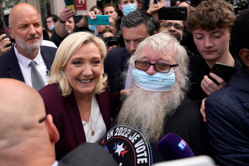 Marine Le Pen on the presidential campaign trail near Paris before the April 24 run-off. AP