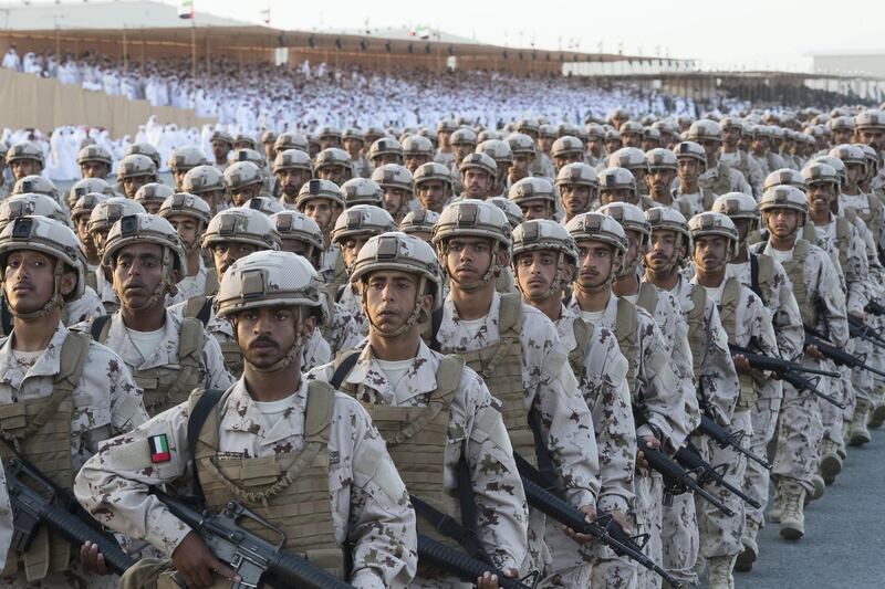 ZAYED MILITARY CITY, ABU DHABI, UNITED ARAB EMIRATES - November 28, 2017: Recruits participate in a parade during the graduation ceremony of the 8th cohort of National Service recruits and the 6th cohort of National Service volunteers at Zayed Military City. 

( Christopher Pike for the Crown Prince Court - Abu Dhabi )
---