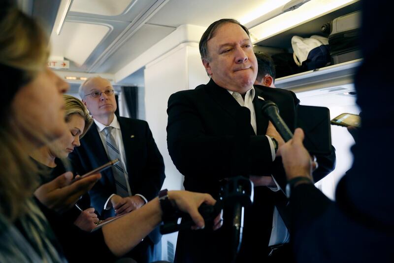 Secretary of State Mike Pompeo speaks to reporters while his plane refuels in Brussels, Belgium Wednesday, Oct. 17, 2018. (Leah Millis/Pool Image via AP)