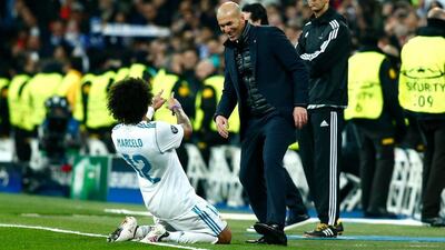 Marcelo celebrates scoring the third Real Madrid goal with manager Zinedine Zidane. Gonzalo Arroyo Moreno / Getty Images