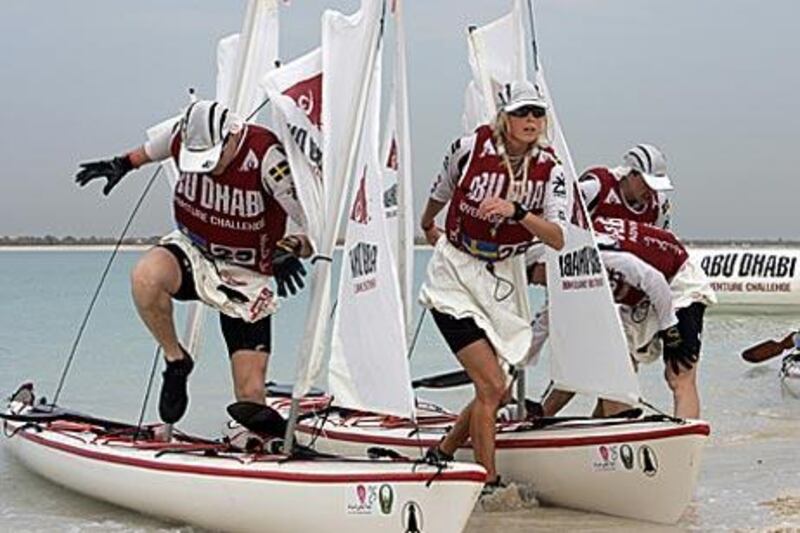 Kristin Larsson, centre, and her teammates compete during  the Adventure Challenge in Abu Dhabi.
