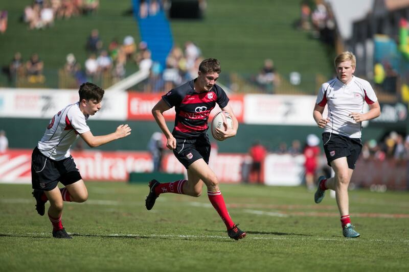 DUBAI, UNITED ARAB EMIRATES - DECEMBER 1, 2018. 

DUBAI COLLEGE A, red, wins against DUBAI COLLEGE B, in GULF UNDER 19 category on the final day of this year's Dubai Rugby Sevens.

(Photo by Reem Mohammed/The National)

Reporter: 
Section:  NA  SP