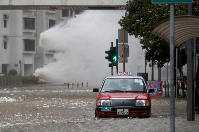 Waves triggered by Typhoon Hato are seen in Hong Kong, China. Tyrone Siu / Reuters.
