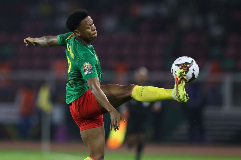 Cameroon forward Clinton Njie kicks the ball during the Africa Cup of Nations 2021 last-16 match against Comoros at Stade d'Olembe in Yaounde on January 24, 2022. Cameroon won the match 2-1. AFP