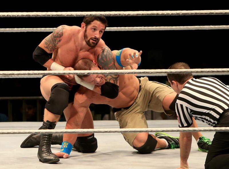 Bad News Barrett, left, in action against John Cena during the WWE's tour of Abu Dhabi last month. Ravindranath / The National