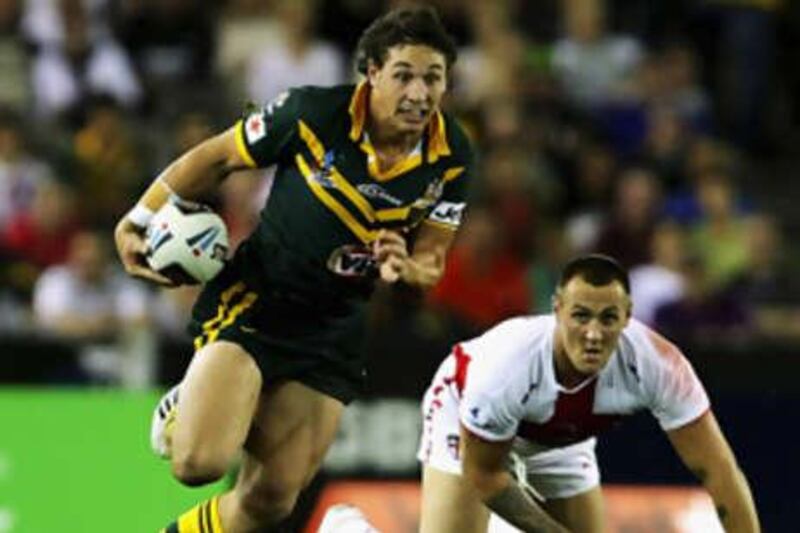 Billy Slater makes a break for Australia against England at the Telstra Dome in Melbourne.
