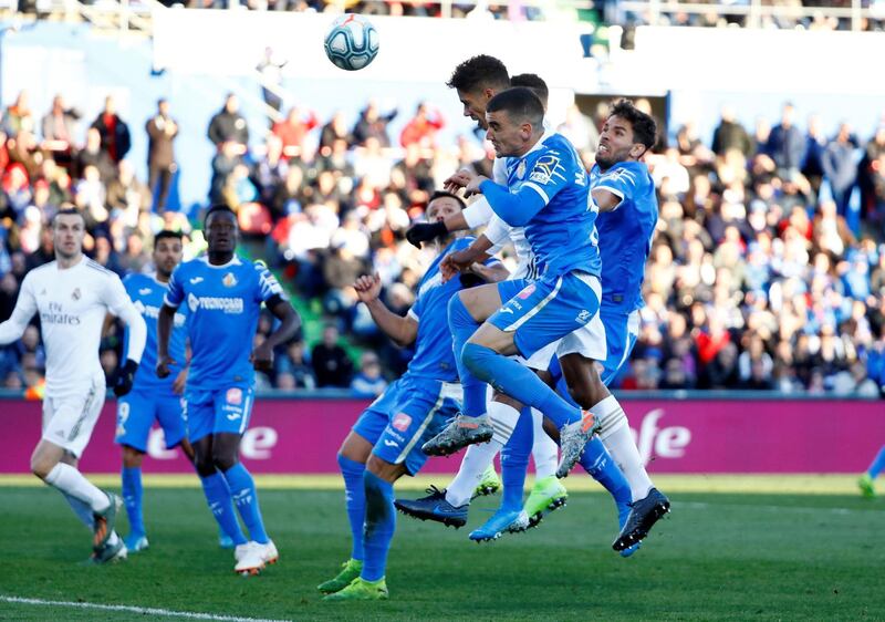 Real Madrid's Raphael Varane scores his team's second goal against Getafe on Saturday. Reuters