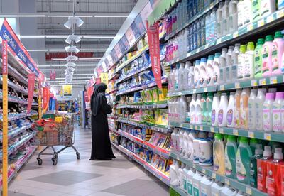 Abu Dhabi, United Arab Emirates, April 21, 2020. 
  Early Ramadan shoppers at Carrefour Yas Mall.  A lady searches for some disinfectants for the Coronavirus Pandemic.
Victor Besa / The National
Section:  NA
For:  Stock images