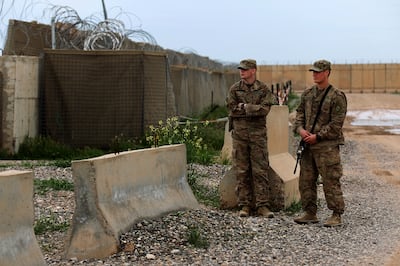 US soldiers stand at the Qayyarah air base, where US-led troops in 2017 had helped Iraqis plan out the fight against the Islamic State in nearby Mosul in northern Iraq. AFP