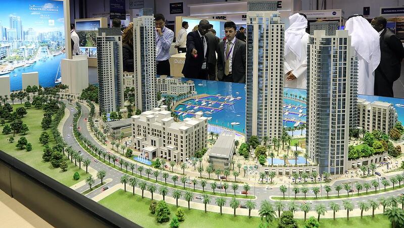 Scale versions of Dubai Creek Harbour projects are on display at the Dubai Properties stand. Satish Kumar / The National