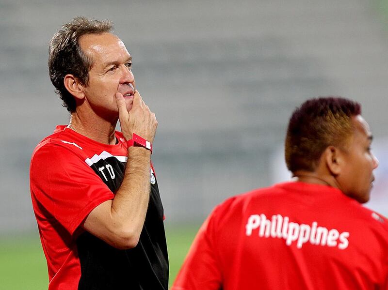 Philippines coach Thomas Dooley, left, looks on during the friendly against Azerbaijan  at the Shabab stadium in Dubai on March 5, 2014. Satish Kumar / The National