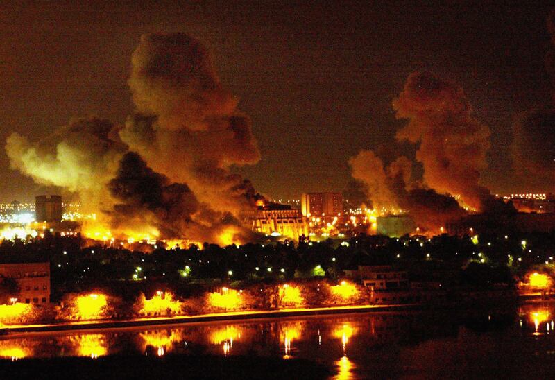 March 21, 2003: Fires burn in and around Saddam's Council of Ministers during the first wave of US-led coalition airstrikes on Iraq in Baghdad. 'These are the opening stages of what will be a broad and concerted campaign,' he says in an address. The attack begins with a massive air strike campaign named 'shock and awe'. Getty
