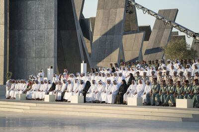 ABU DHABI, UNITED ARAB EMIRATES - November 30, 2017: Guests attend a Commemoration Day ceremony at Wahat Al Karama, a memorial dedicated to the memory of UAE’s National Heroes in honour of their sacrifice and in recognition of their heroism.
( Mohamed Al Hammadi / Crown Prince Court - Abu Dhabi )
---