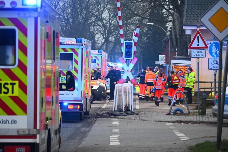 Rescue teams at a railway crossing near Brokstedt station. AFP