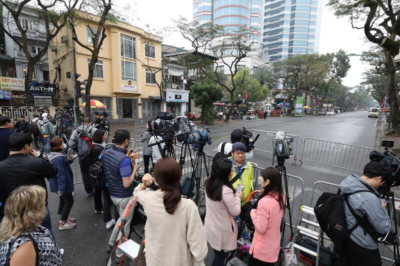 Members of the media stand outside the Melia hotel in Hanoi, Vietnam after Donald Trump arrived. Bloomberg