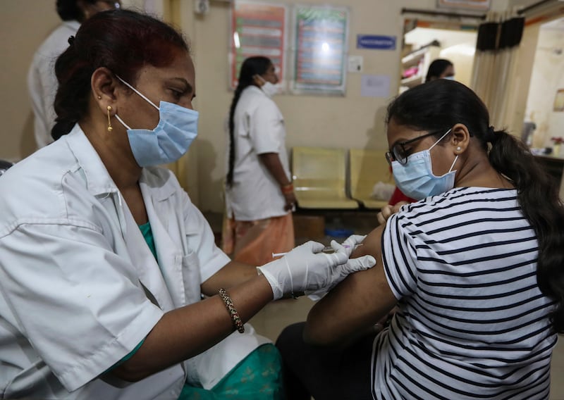 A teenager receives a Covaxin Covid-19 vaccine at a government hospital in Hyderabad, India.  AP Photo