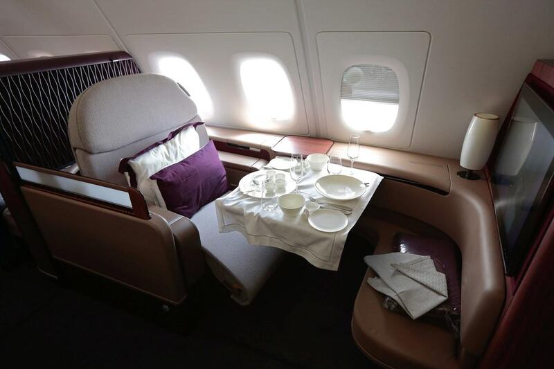 A dining set sits on the table of a first class passenger. Jason Alden / Bloomberg