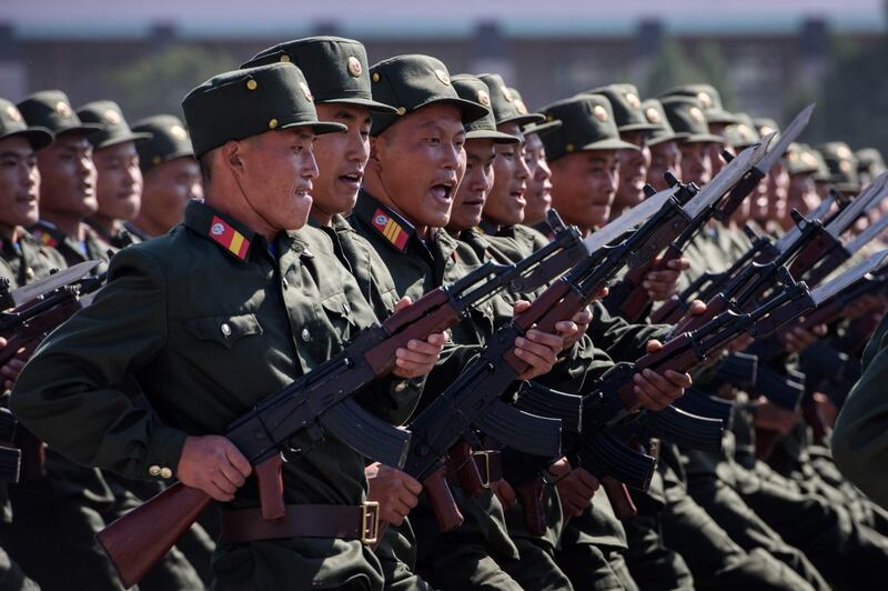 Korean People's Army (KPA) soldiers march during a mass rally on Kim Il Sung square in Pyongyang.   AFP