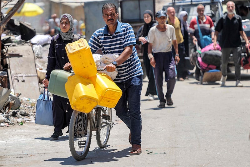 Gazans fleeing the Shujaiya neighbourhood in eastern Gaza city. AFP