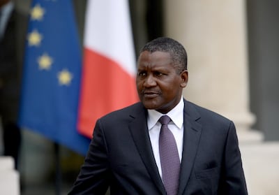 Nigerian businessman and Africa's richest man Aliko Dangote leaves the Elysee presidential Palace following a meeting between French President and French and African businessmen on October 7, 2016 at  in Paris. (Photo by STEPHANE DE SAKUTIN / AFP)
