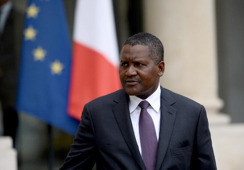 Nigerian businessman and Africa's richest man Aliko Dangote leaves the Elysee presidential Palace following a meeting between French President and French and African businessmen on October 7, 2016 at  in Paris. (Photo by STEPHANE DE SAKUTIN / AFP)