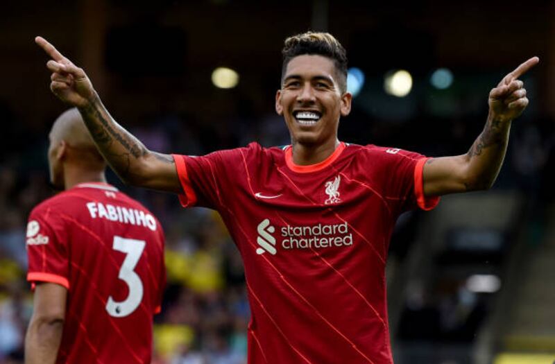 Roberto Firmino of Liverpool celebrates after scoring the second goal.