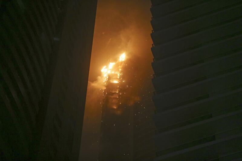 Hundreds were evacuated from the skyscraper, which is 336.1 metres tall and located in the Marina district of the city. Sarah Dea / The National