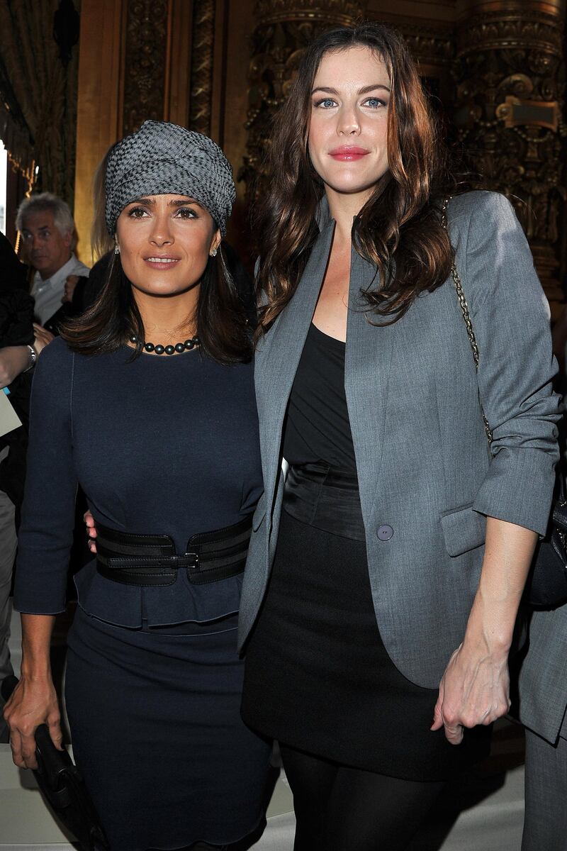 PARIS - OCTOBER 04:  Salma Hayek and Liv Tyler attend the Stella McCartney Ready to Wear Spring/Summer 2011 show during Paris Fashion Week at Opera Garnier on October 4, 2010 in Paris, France.  (Photo by Pascal Le Segretain/Getty Images)