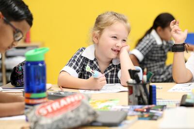 Pupils in a Year 3 class at Brighton College Dubai on Wednesday, as new mask rules came into effect. Chris Whiteoak / The National