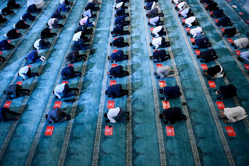 Russians pray at the Sobornaya Mosque in Moscow.