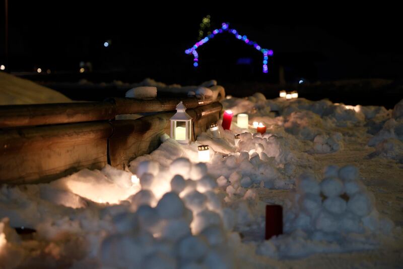 Candles are placed at the outer edge of the landslide in Ask in Gjerdrum municipality, Norway. Several homes have been taken by the avalanche and nine people remain missing after one body was found. More than 1,000 people in the area have been evacuated.  EPA