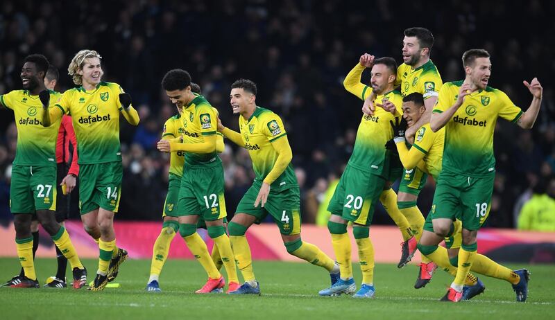 Norwich players celebrate after beating Tottenham. EPA