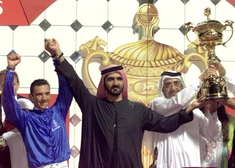 Sheikh Mohammed bin Rashid and jockey Frankie Dettori celebrate Godolphin's victory with Dubai Millennium at the 2000 Dubai World Cup. Reuters 