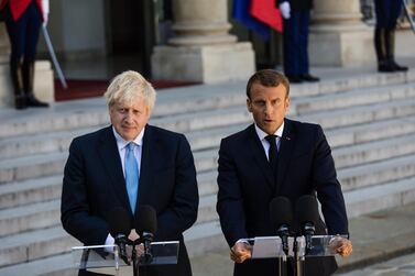 French President Emmanuel Macron (right) told Boris Johnson, UK prime minister, on Sunday that Brexit talks could only be advanced through the EU’s chief Brexit negotiator Michel Barnier. Jeanne Frank/Bloomberg