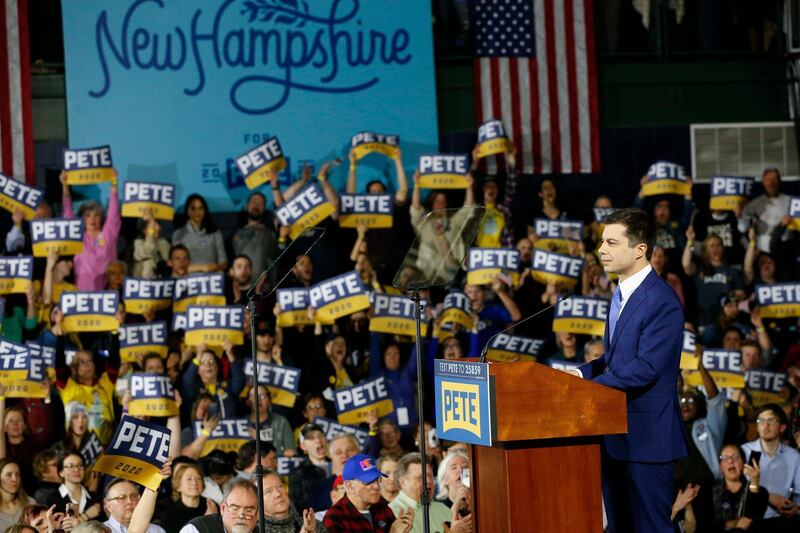 Former mayor Pete Buttigieg (R), Democratic candidate for United States President, speaks to supporters during he's primary night rally in Nashua, New Hampshire, USA.  EPA