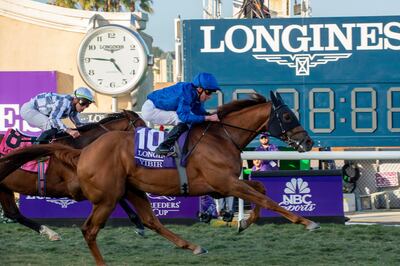 William Buick, on Yibir, claims victory in the Breeders' Cup Turf. AP