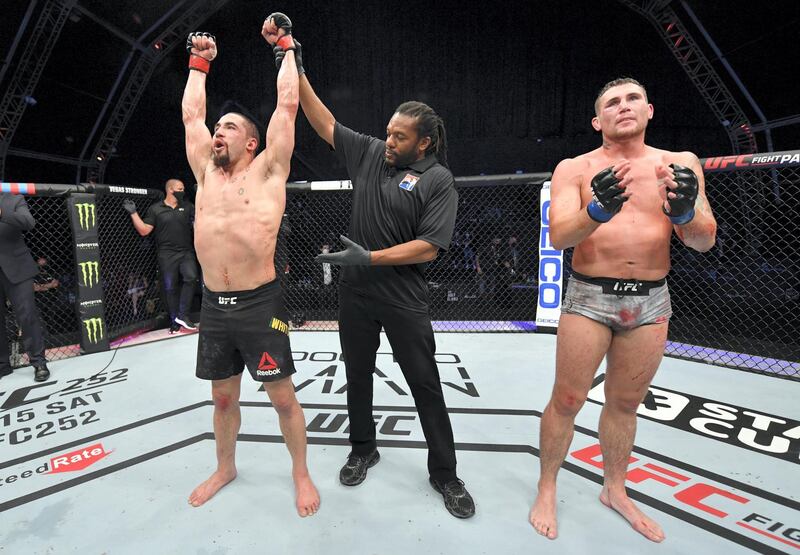 ABU DHABI, UNITED ARAB EMIRATES - JULY 26: Robert Whittaker of New Zealand celebrates after his victory over Darren Till of England in their middleweight fight during the UFC Fight Night event inside Flash Forum on UFC Fight Island on July 26, 2020 in Yas Island, Abu Dhabi, United Arab Emirates. (Photo by Jeff Bottari/Zuffa LLC via Getty Images)