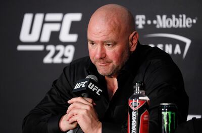 FILE - In this Oct. 6, 2018, file photo, Dana White, president of the UFC, speaks at a news conference after the UFC 229 mixed martial arts event in Las Vegas. The UFC is determined to fight on amid the worldwide coronavirus outbreak. The UFC hasn't canceled any competitions, even those previously scheduled for areas where large gatherings are now banned. White attributes his decision to go against the sports world's collective mindset partly to a conversation Thursday, March 12, 2020, with President Donald Trump and Vice President Mike Pence.  (AP Photo/John Locher, File)